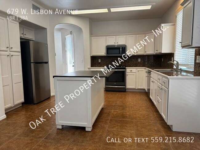 Building Photo - 679 W Lisbon Ln
