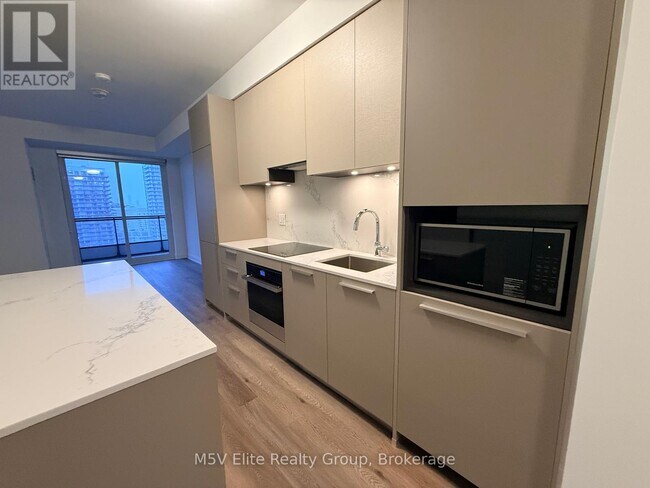 Photo du bâtiment - 65 Broadway Ave