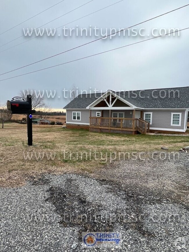 Building Photo - 1025 W Frontage Rd
