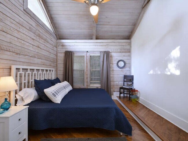 Bedroom #2. Downstairs with king size bed. - 514 Deep Eddy Ave