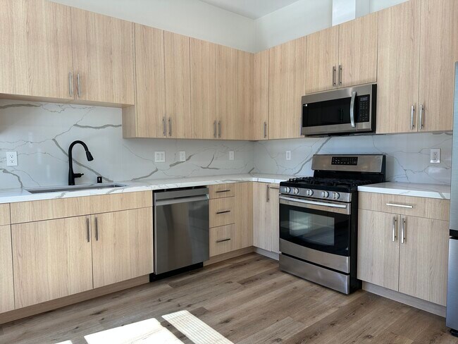 Foto del edificio - 6571 Ponce Ave