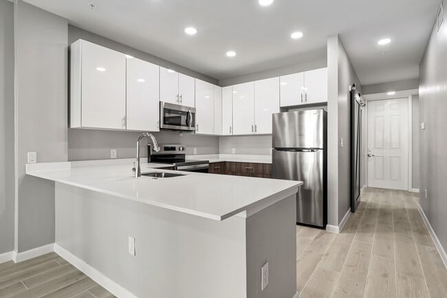 Building Photo - The Apartments at the Isles of Porto Vista