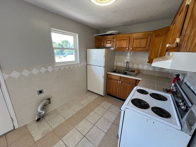 Foto del edificio - 6206 E 155th St