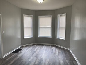 Building Photo - 7240 S Langley Ave
