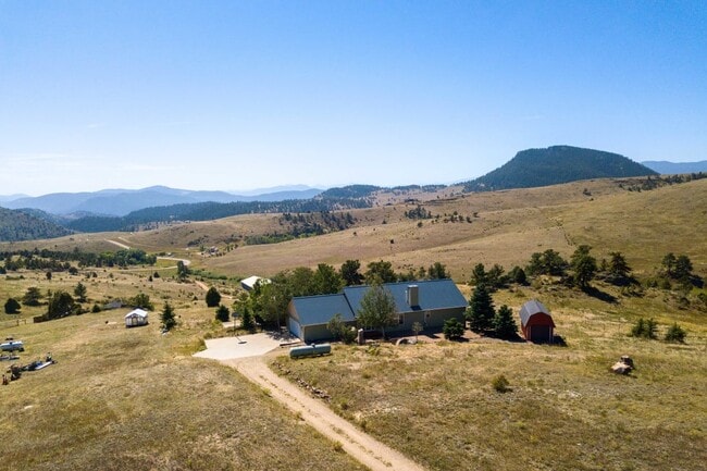 A peaceful slice of Rocky Mountain living while close to downtown amenities. - 4547 Camino Perdido