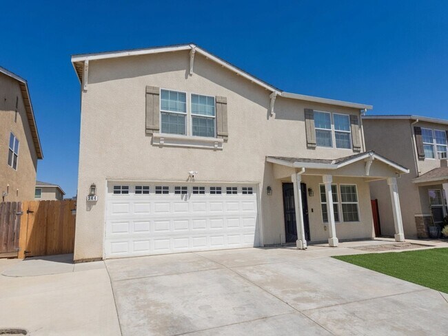 Foto del edificio - Spacious 4-Bedroom Home with Solar, Finished Garage, Large Pantry & Low-Maintenance Backyard in M...
