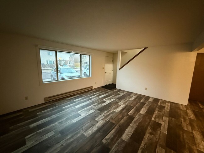 Building Photo - Two bedroom, one and bathroom townhome loc...