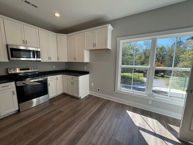 Building Photo - Sunburst Villa Luxury Townhouse WITH BASEMENT