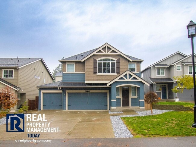 Building Photo - Spacious Modern 5-Bedroom Home with 3-Car ...