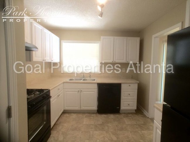 Foto del edificio - 6229 Holiday Blvd