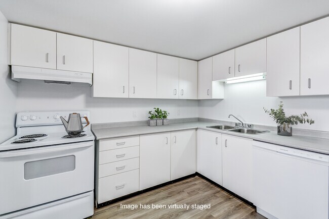 Photo du bâtiment - Queens Park Residences