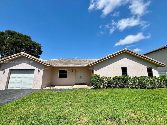Foto del edificio - 11615 NW 23rd Ct