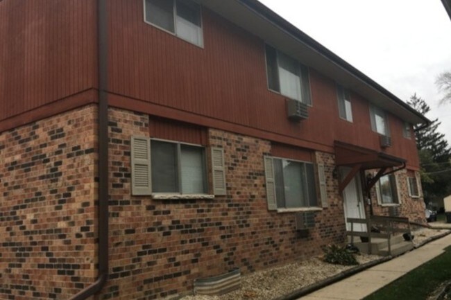 Nestled in between single family homes - 1960 S 79th St