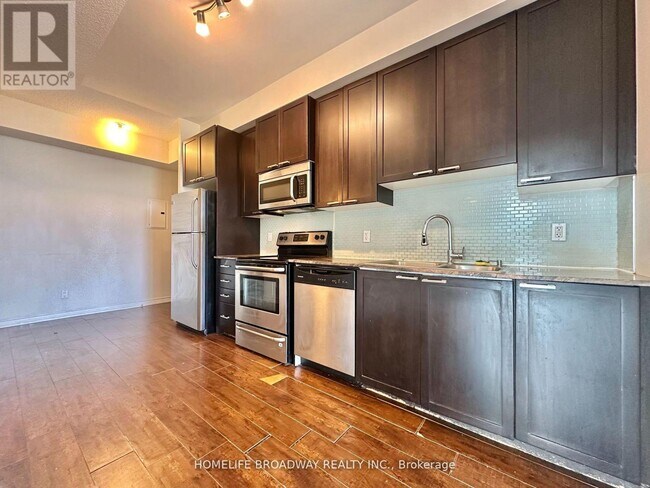 Photo du bâtiment - 1328 Birchmount Rd