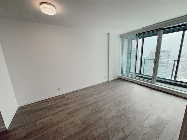 Building Photo - Aquilini Centre West - 2006