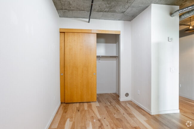 1BR, 1BA - 1,033SF - Bedroom - Waterside Lofts