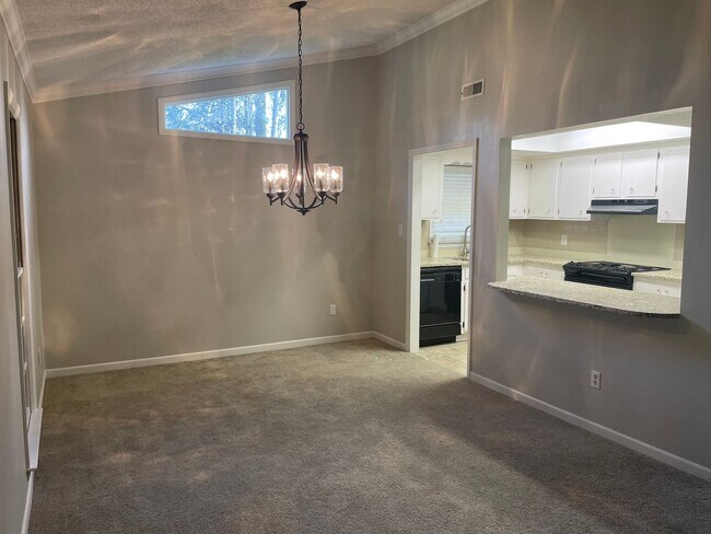 Building Photo - Large 1246 SQ FT 1 bed condo off Carmel Rd