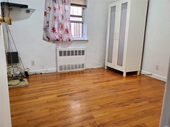 Building Photo - 130-11 58th Ave