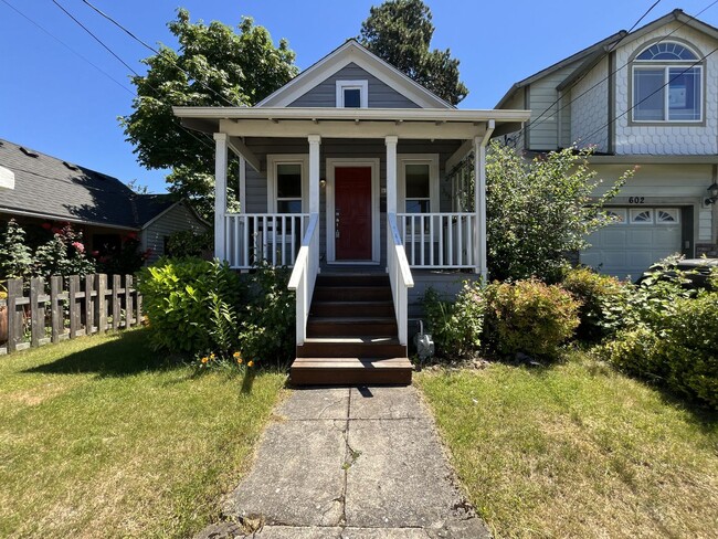Building Photo - Charming Cottage with Hardwood Flooring, Modern Kitchen & Beautiful Outdoor Living Areas