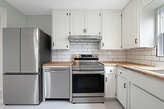 Building Photo - Large Corner Lot with a newly remodeled 2 ...