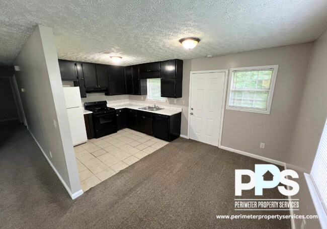 Foto del edificio - 5917 Summerglen Ln