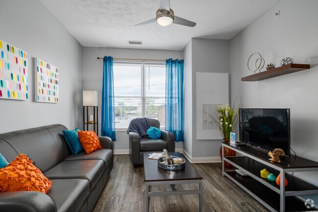 Corner - 4BR, 2BA - 1,282SF - Living Room - 345 Flats