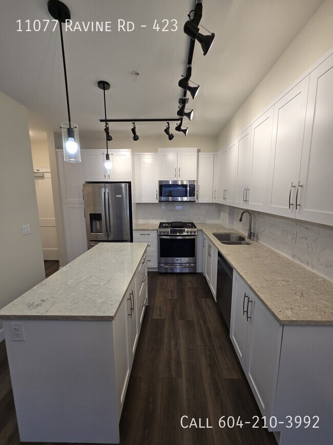 Photo du bâtiment - Modern Condo Near King George