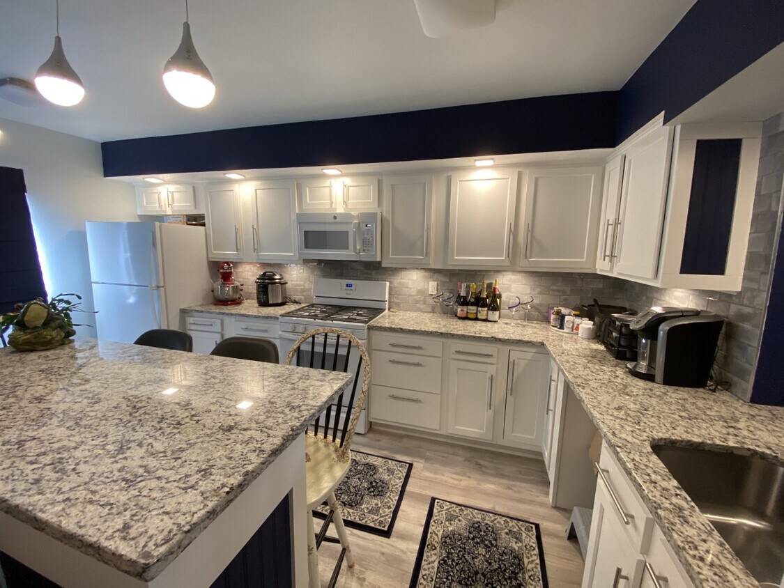 Kitchen with Granite counters and new cabinets. - 4 Staunton Ct