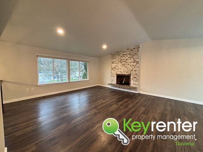 Building Photo - Split level 3 Bed 2 Bath Upstairs Unit with Modern Upgrades Close to JBLM!