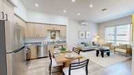 Located at 580 Media Pl in Sacramento, CA, this well-appointed 2-bedroom, 2-bathroom residence offers a thoughtfully designed single-level layout. The open-concept kitchen and living area serves as the heart of the home, featuring light wood cabinetry, granite countertops, stainless steel appliances including a refrigerator, range, microwave, and dishwasher, and durable wood-style flooring. Soaring ceilings in the kitchen area enhance the sense of openness, while recessed lighting adds a clean, modern touch. The living room is bright and welcoming, with large windows that invite generous natural light and outdoor views. A wall-mounted mini-split system provides efficient climate control. Both bedrooms are carpeted and comfortably proportioned, each featuring windows with blinds that allow for natural light. The primary bedroom offers a dedicated closet, while the secondary bedroom includes a built-in closet as well. The two bathrooms are finished with wood-tone vanities, granite countertops, and wood-style tile flooring. The primary bath features a spacious vanity with ample storage, while the secondary bath includes a soaking tub with shower. The overall aesthetic is clean, contemporary, and cohesive throughout.