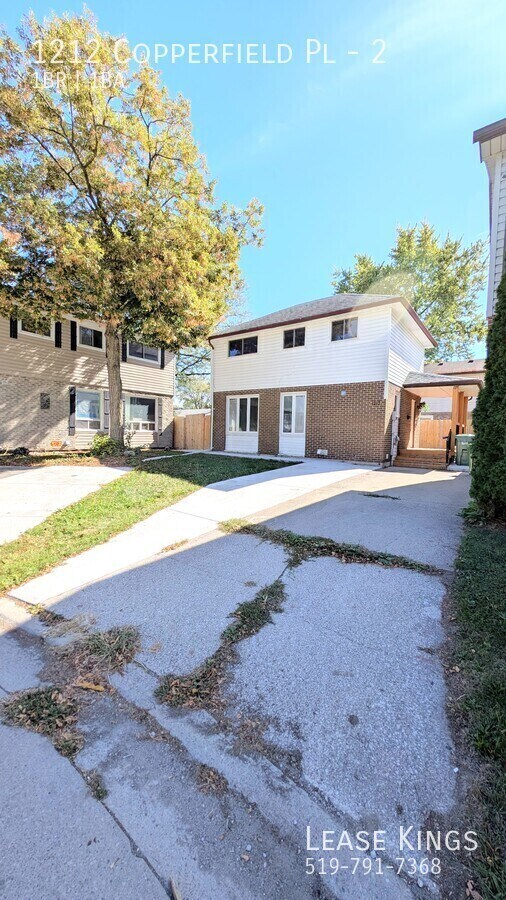 Photo du bâtiment - Cozy 1-Bedroom Basement Unit in South Wind...