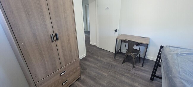 Building Photo - Beds Available Newly Renovated Building , ...