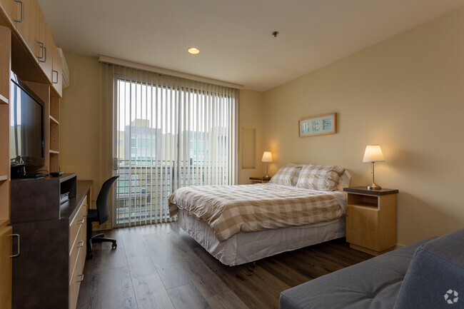 Queen bed and Futon/couch - Breeze Suites Moderne