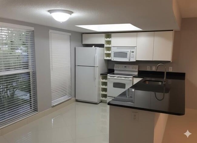 Foto del edificio - 704 NE 23rd Ave