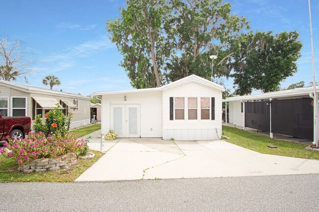 Building Photo - Home in 55+ Community now available!