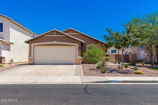 Front - 3209 N 130th Ave