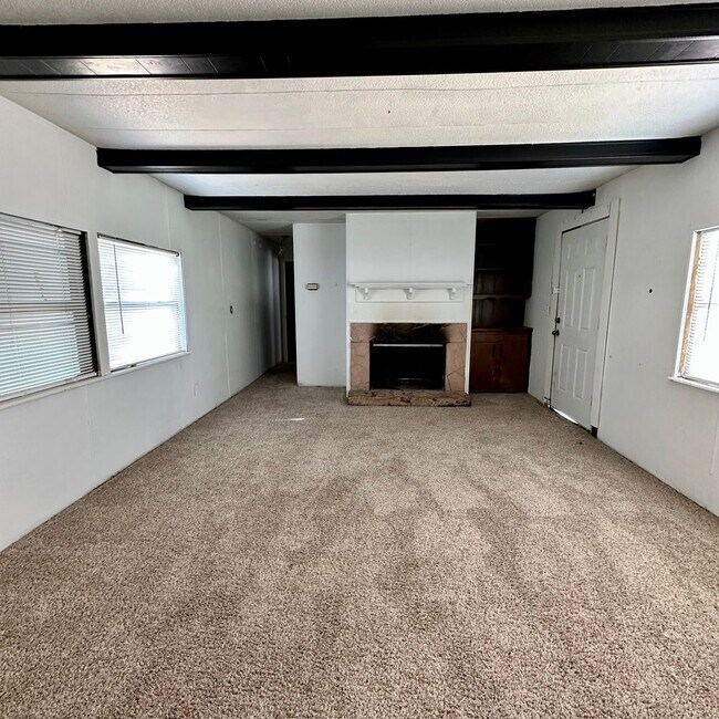 Building Photo - Move in Special 1/2 off first full months ...