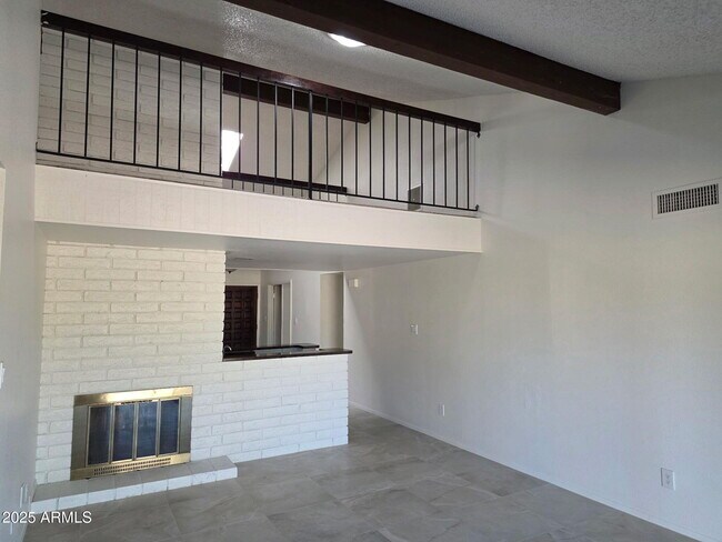 Building Photo - 1650 W Kiowa Ave