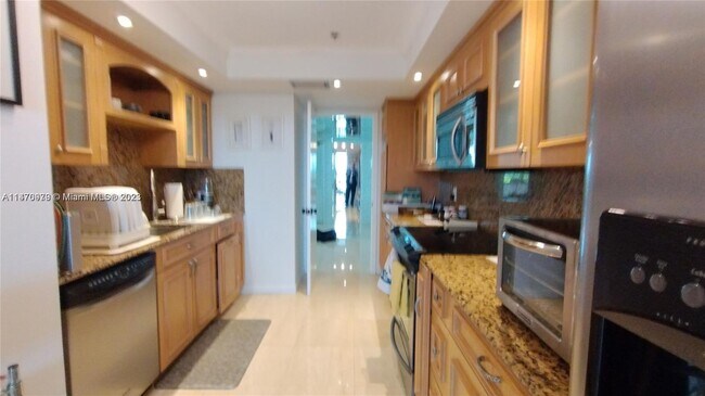 Building Photo - 10175 Collins Ave
