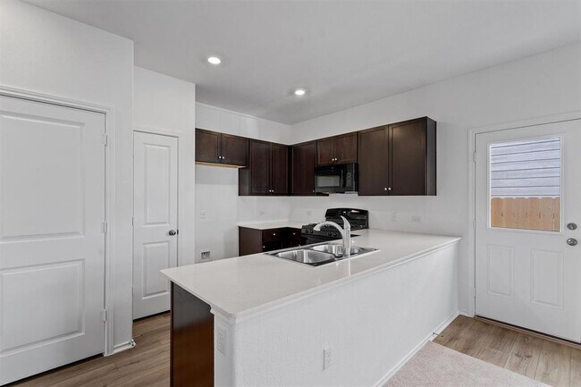 Building Photo - 7704 Poppy Petal Dr