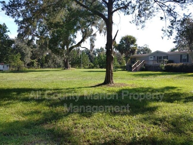 Building Photo - 6455 NW 135th Ave
