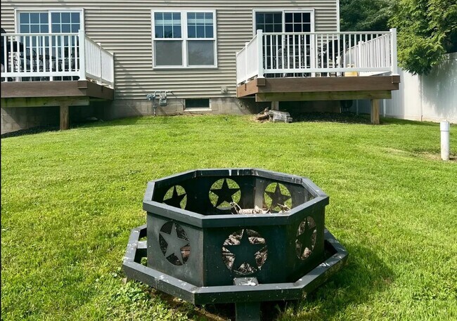 backyard with fire pit - 8388 Bay St