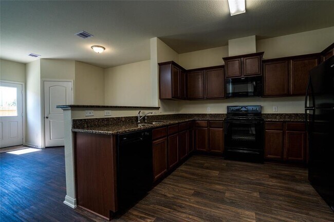 Foto del edificio - 208 Autumn Berry Ln