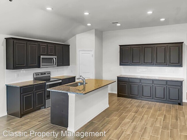 Building Photo - 4 br, 2 bath House - 10008 Ginkgo Lane