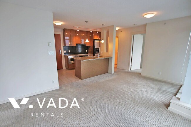 Photo du bâtiment - The Melville Coal Harbour 2 Bedroom Apartm...