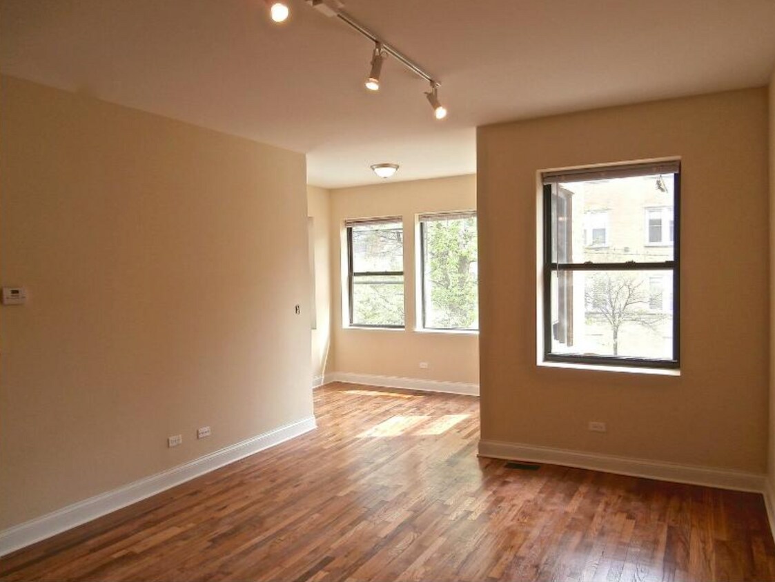 Spacious and Sunny Living Room and Bonus Sunroom - 3214 W Argyle St