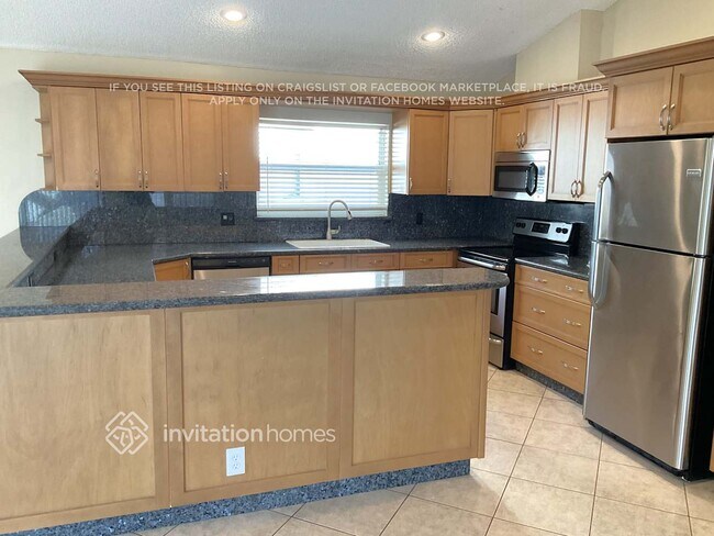 Building Photo - 8825 NW 57th Ct