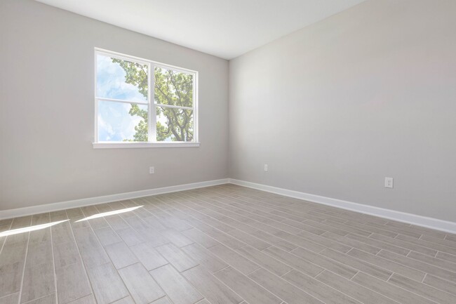 Building Photo - Brand new home for rent! Enjoy a sleek, co...