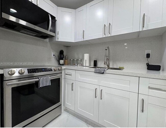 Building Photo - 4265 NW S Tamiami Canal Dr