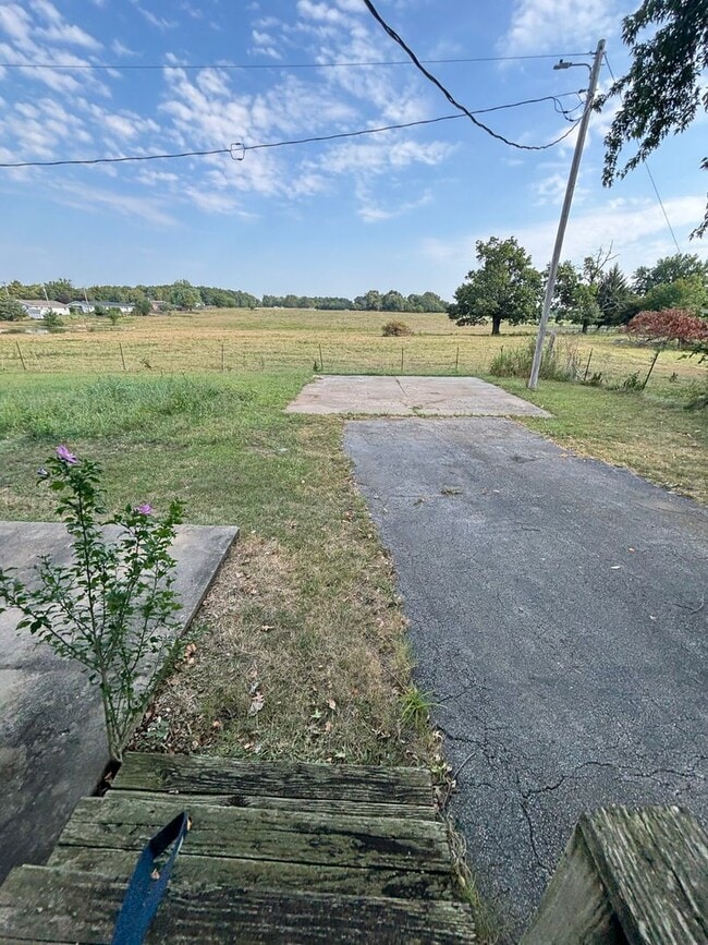 Building Photo - 7033 W Farm Rd 106